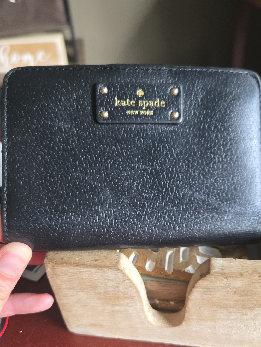 kate spade Black Leather Zip-Around Wallet with Gold Logo